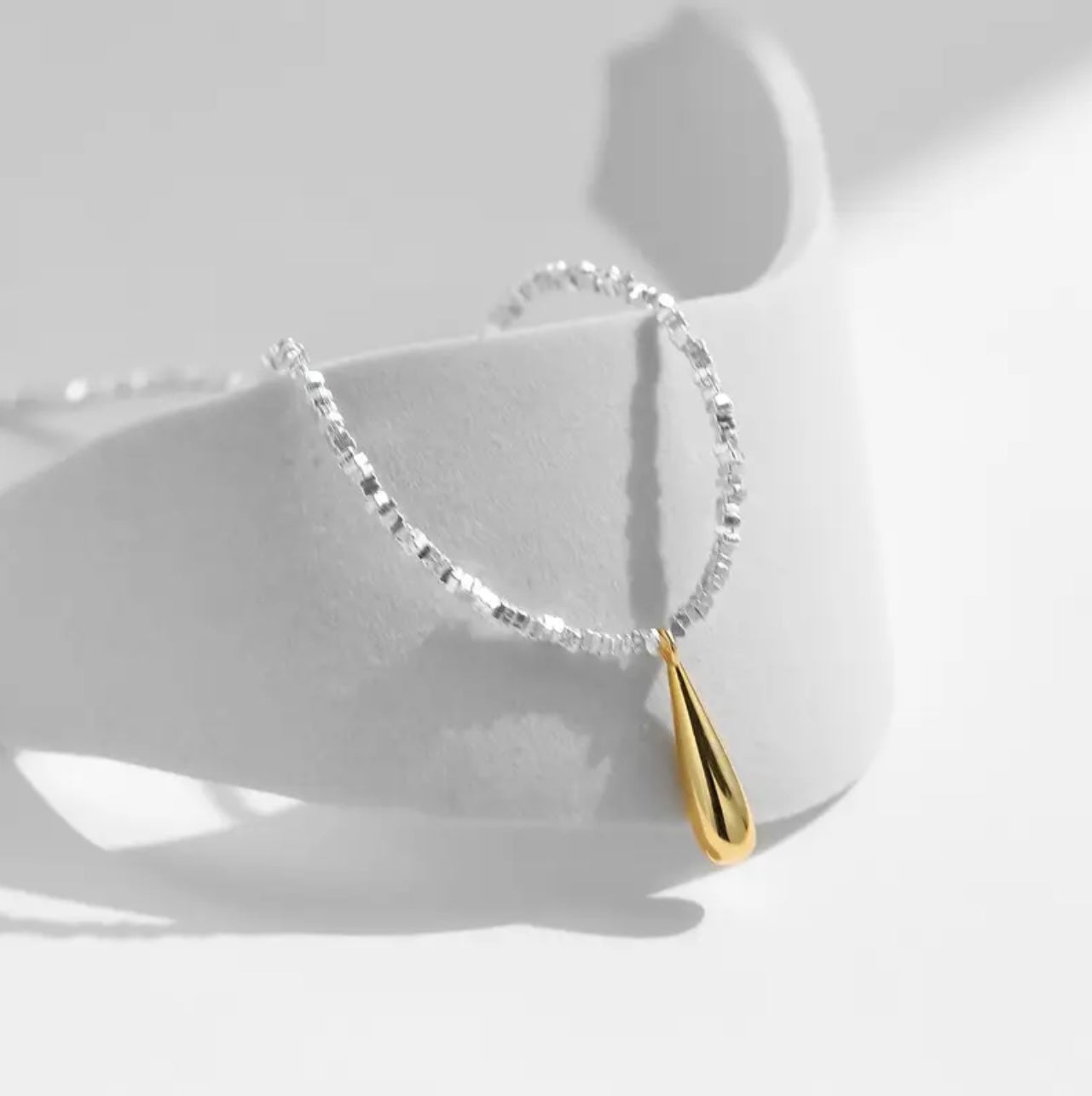 Golden drop silver necklace