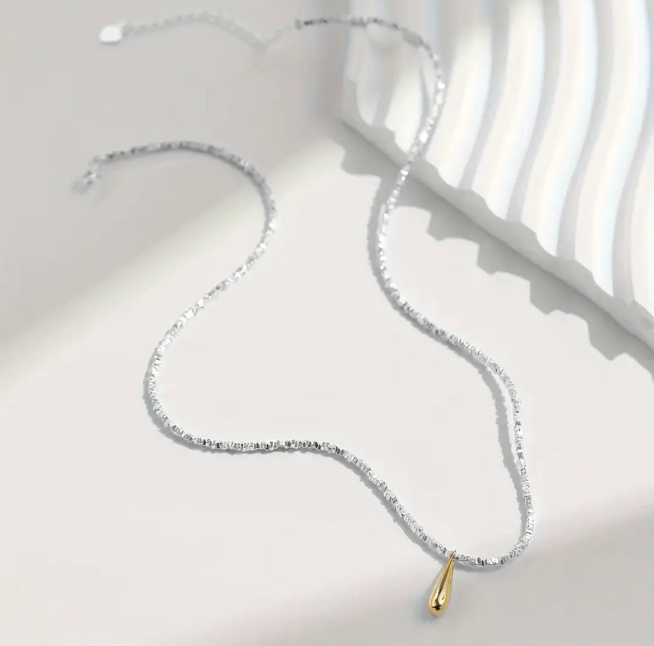 Golden drop silver necklace