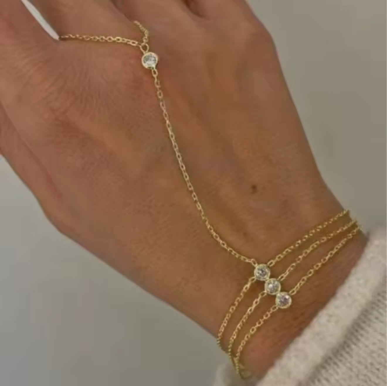 Triple stone handchain